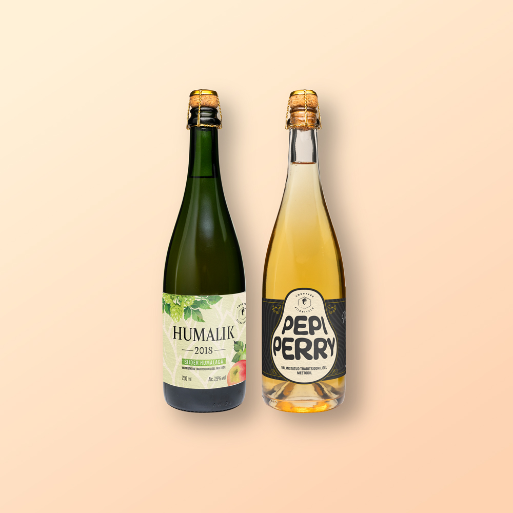 Two craft cider bottles designed by Orgmets Creative – Humalik hopped cider and Pepi Perry perry.